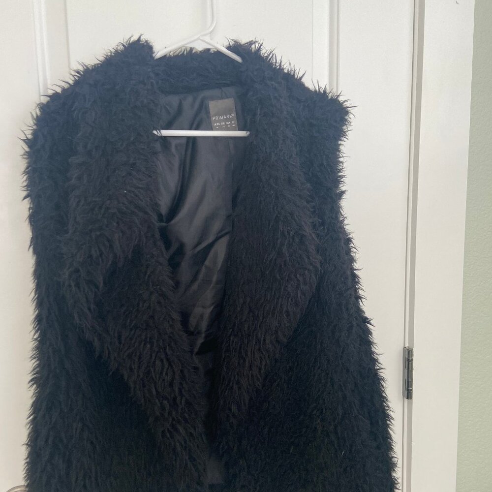 Black fur vest